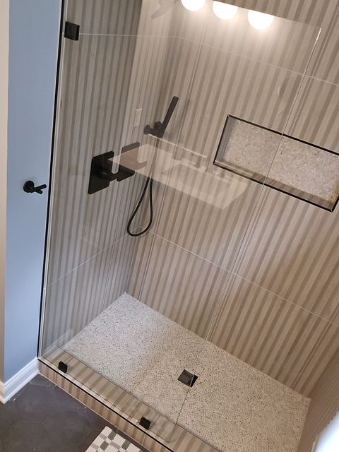 Custom glass shower enclosure installed by Battlefield Glass