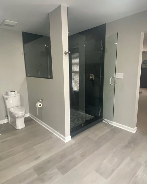 Custom glass shower enclosure installed by Battlefield Glass