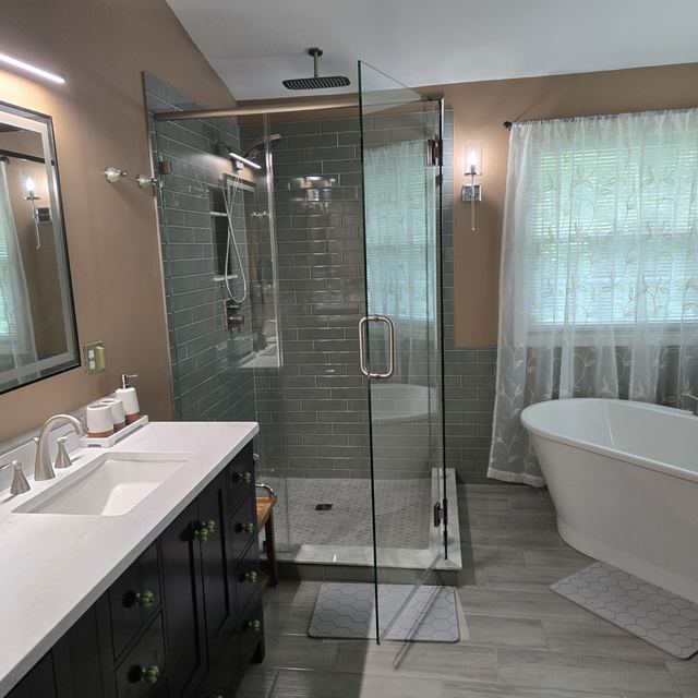 Custom glass shower enclosure installed by Battlefield Glass