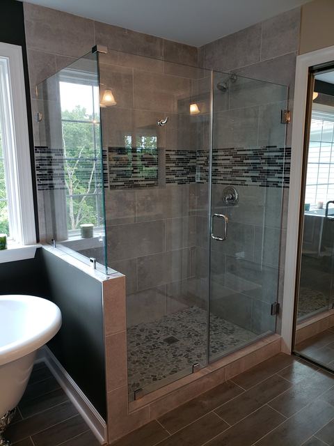 Custom glass shower enclosure installed by Battlefield Glass