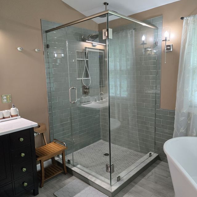 Custom glass shower enclosure installed by Battlefield Glass