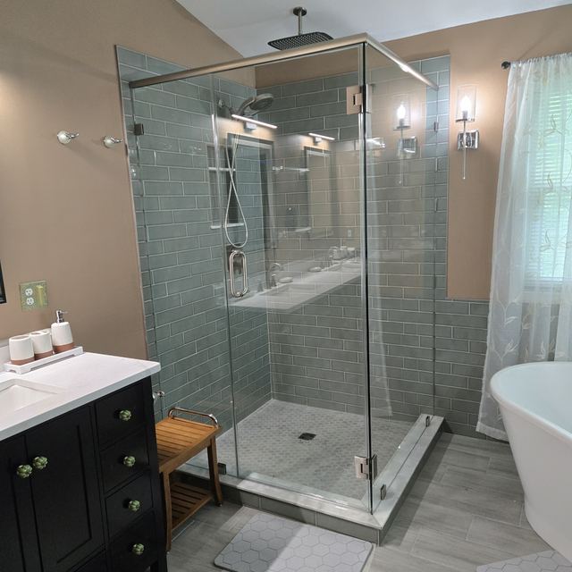 Custom glass shower enclosure installed by Battlefield Glass