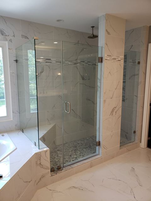 Custom glass shower enclosure installed by Battlefield Glass