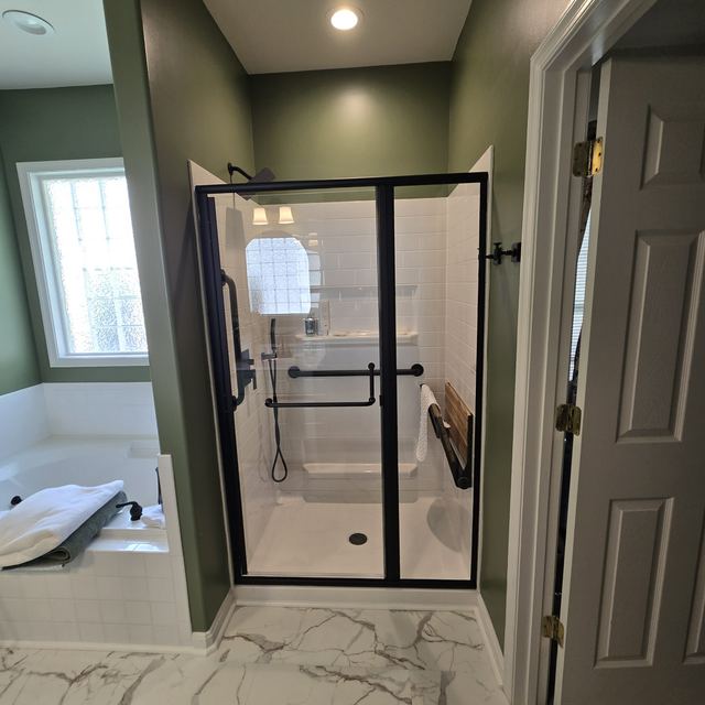 Custom glass shower enclosure installed by Battlefield Glass