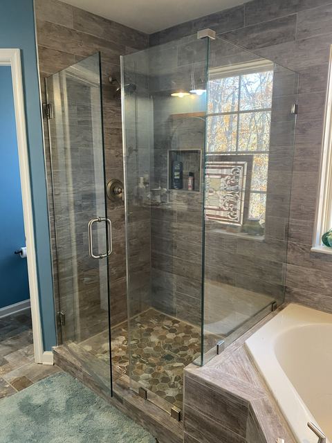 Custom glass shower enclosure installed by Battlefield Glass