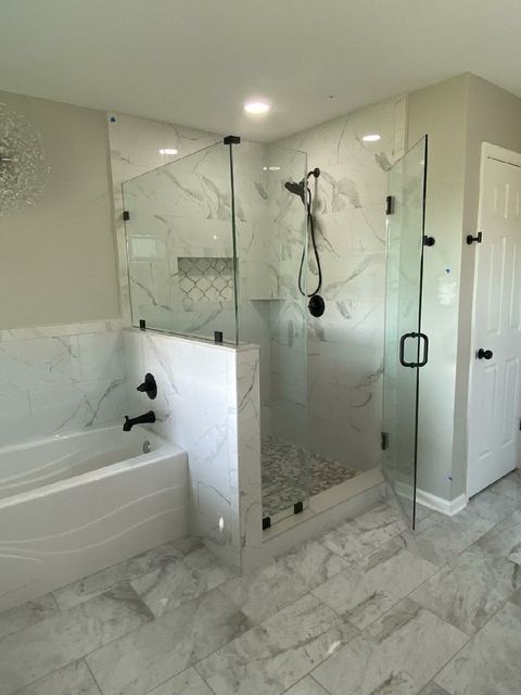 Custom glass shower enclosure installed by Battlefield Glass