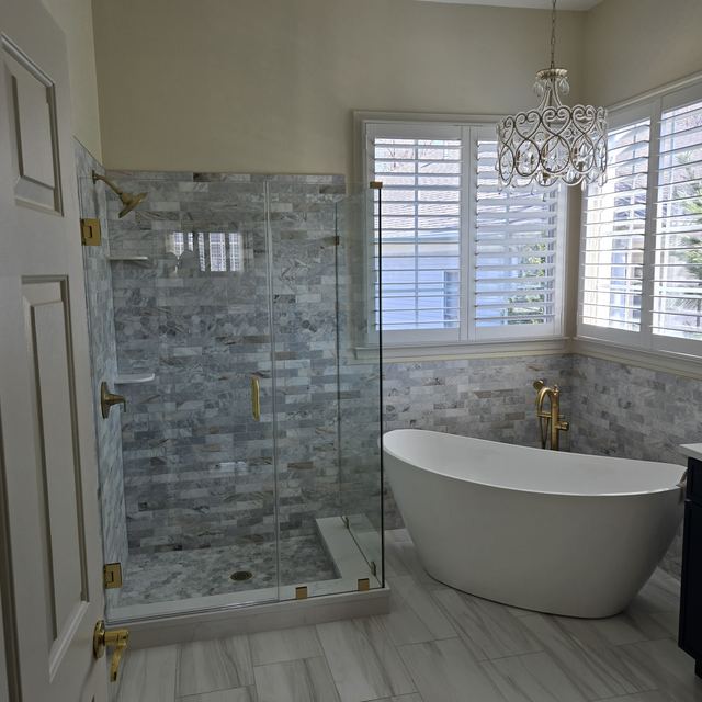 Custom glass shower enclosure installed by Battlefield Glass
