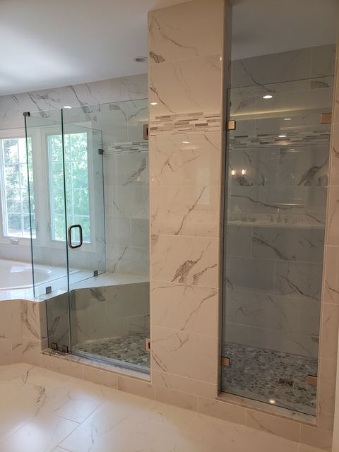 Custom glass shower enclosure installed by Battlefield Glass