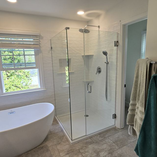 Custom glass shower enclosure installed by Battlefield Glass