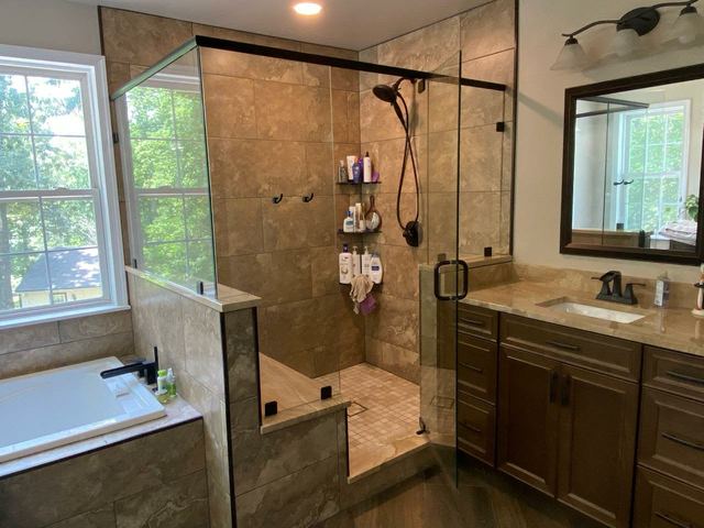 Custom glass shower enclosure installed by Battlefield Glass